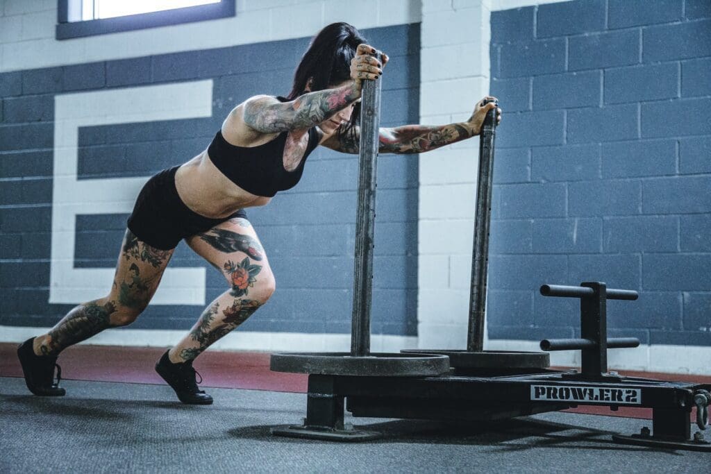 woman doing workout in room CROSSFIT