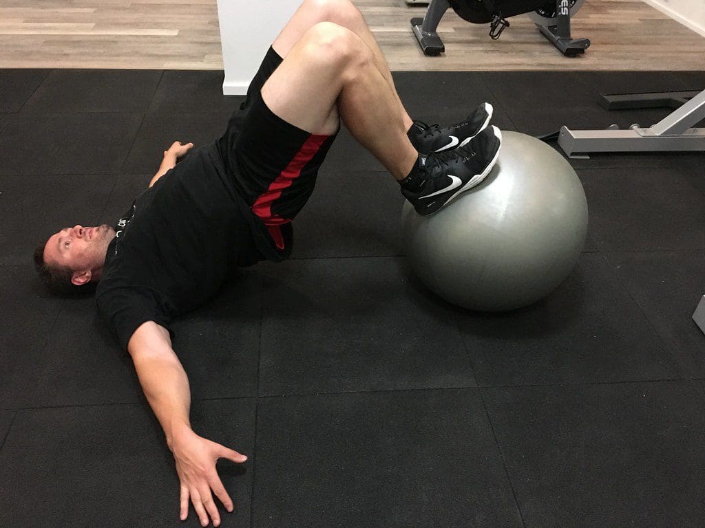 leg curl swiss ball