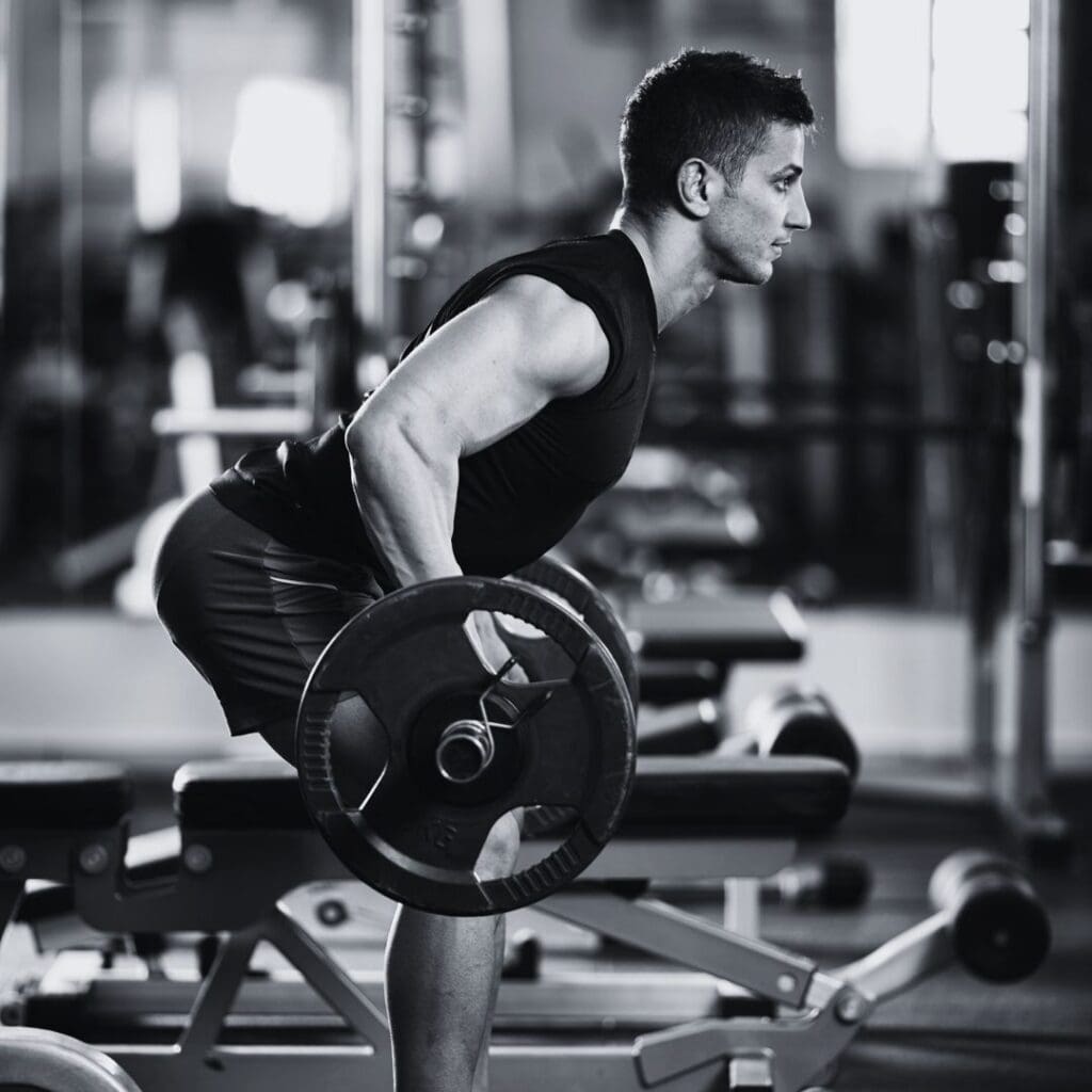 homme rowing barre